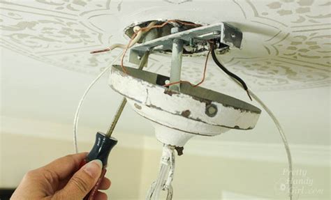 how to hang chandelier from junction box|how to install a chandelier box.